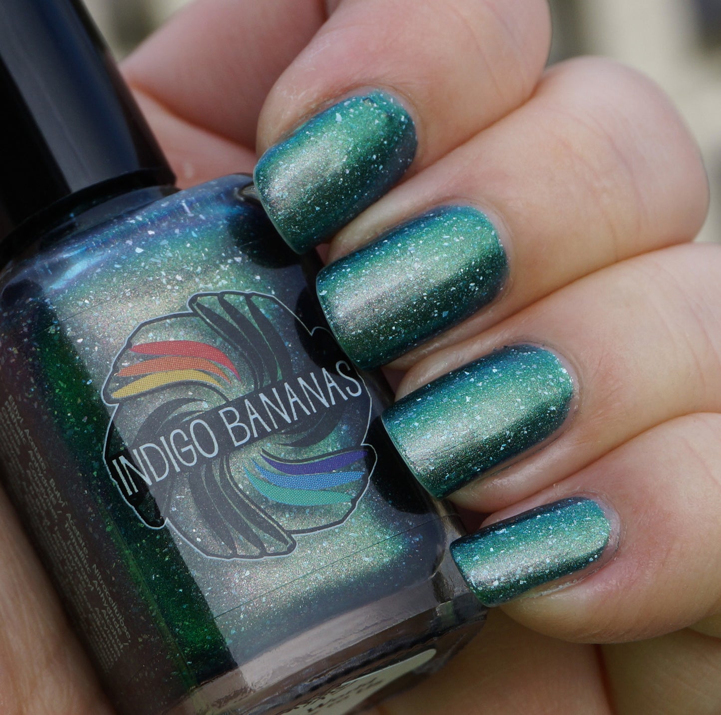 This World Belongs to Us - bright green/blue multichrome linear holographic w/ flakies